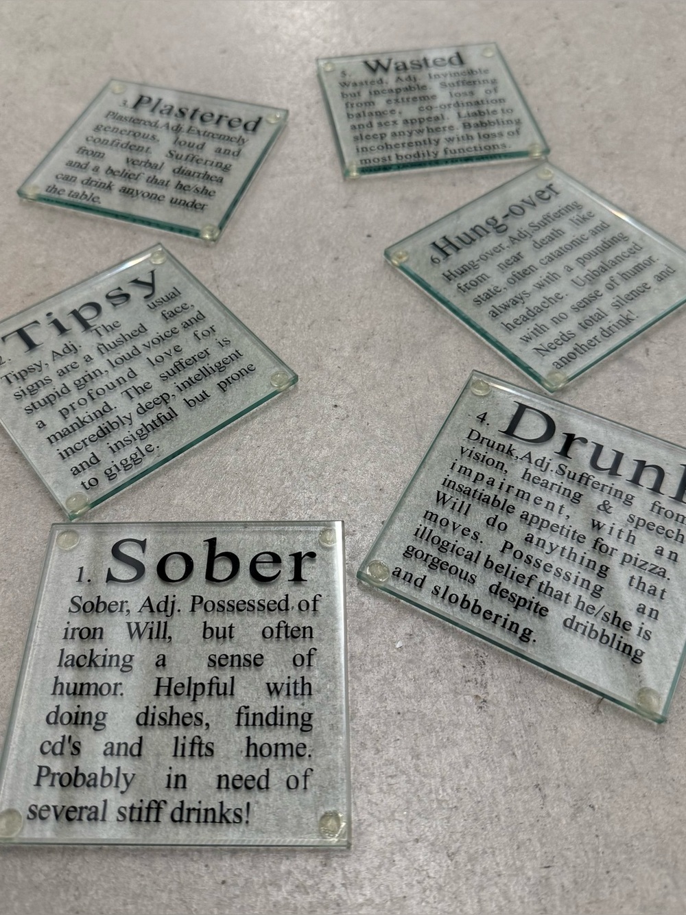 Set of 6 Glass Coasters with words that  define the stages of drinking